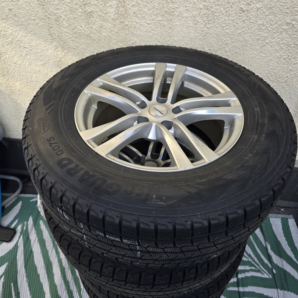 Winter Tires On Silver Alloy Rims P245/70R17